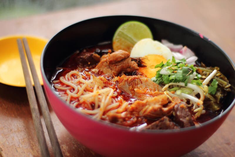 Close up thai northern spicy pork noodle in cup. Close up thai northern spicy pork noodle in cup