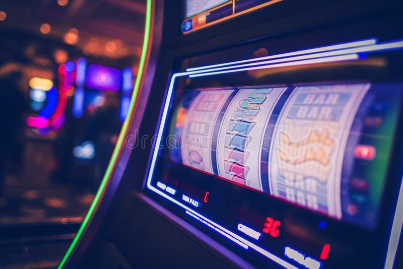 Spinning Drums of Slot Machine Inside the Casino. Modern Digital One Handed Bandit Game. Spinning Drums of Slot Machine Inside the Casino. Modern Digital One Handed Bandit Game.