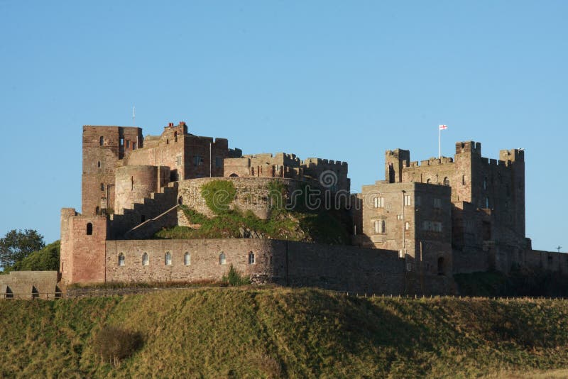 замок bamburgh стоковая фотография замок bamburgh стоковая фотография