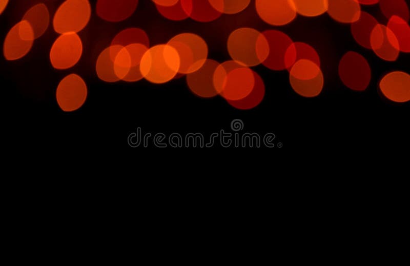 Запачканный, Bokeh, Defocused свет красного цвета в темноте, для абстрактной предпосылки с открытым космосом для дизайна и текста стоковая фотография rf Запачканный, Bokeh, Defocused свет красного цвета в темноте, для абстрактной предпосылки с открытым космосом для дизайна и текста стоковая фотография rf