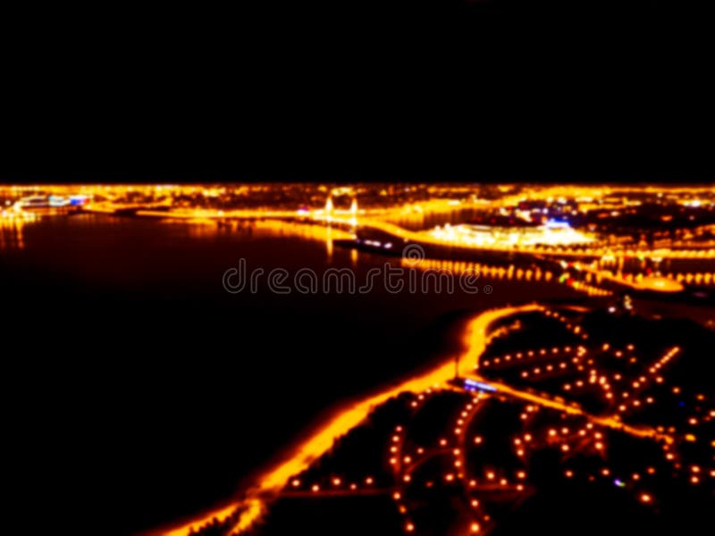 Запачканный взгляд ночи предпосылки воздушный большого города Bokeh панорамы городского пейзажа на ноче Расплывчатый вид с воздух стоковое изображение Запачканный взгляд ночи предпосылки воздушный большого города Bokeh панорамы городского пейзажа на ноче Расплывчатый вид с воздух стоковое изображение