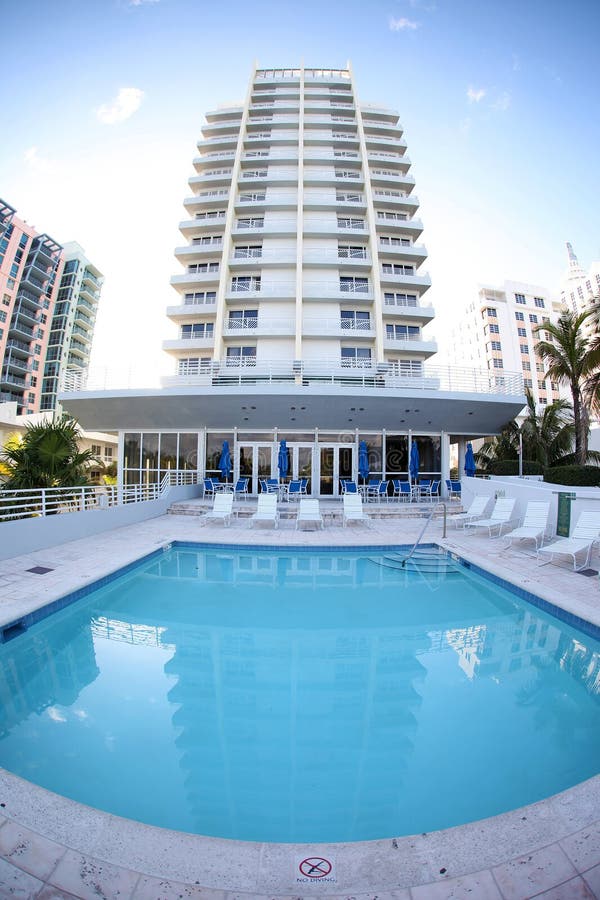 Low angle view of Royal Palms hotel with swimming pool in foreground, Miami beach, Florida, U.S.A. Low angle view of Royal Palms hotel with swimming pool in foreground, Miami beach, Florida, U.S.A.