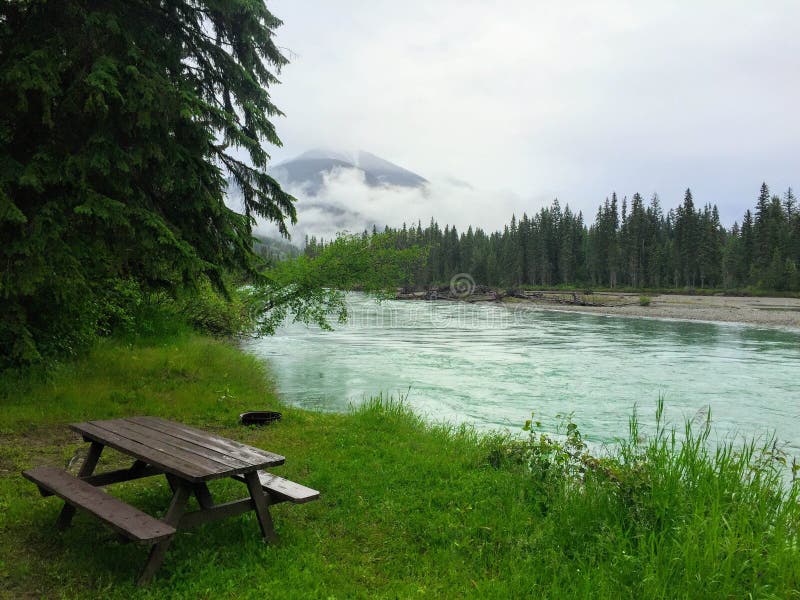 Desolate peaceful campground on the Fraser river near Mount Robson in beautiful British Columbia, Canada. Desolate peaceful campground on the Fraser river near Mount Robson in beautiful British Columbia, Canada