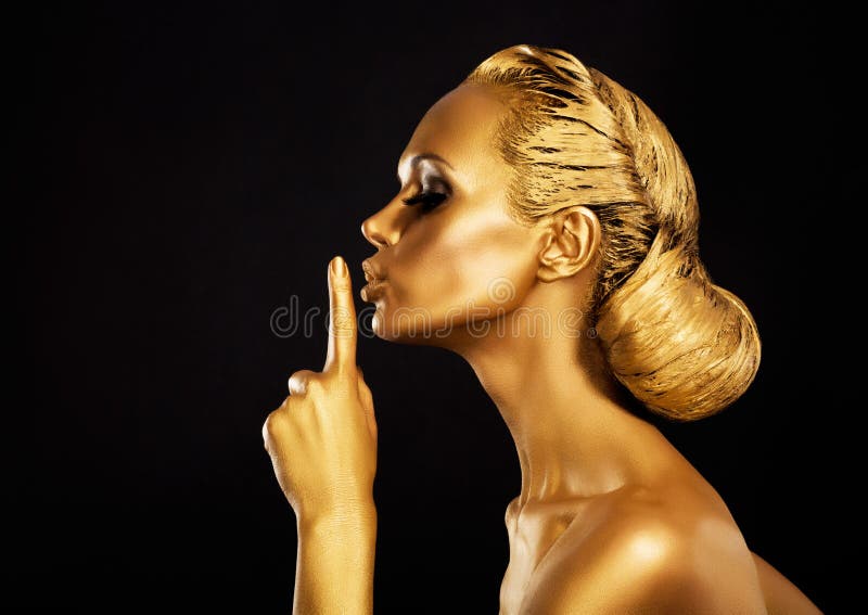 Gold Fancy Woman showing Silence Sign. Hush. Gold Fancy Woman showing Silence Sign. Hush