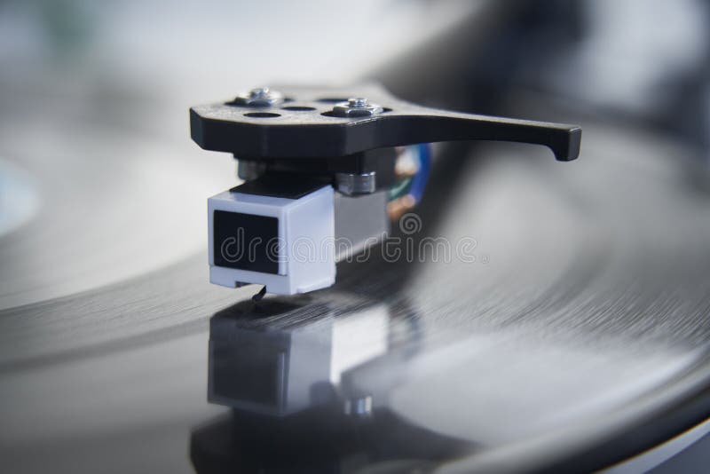 Close Up Of  Record Player Turntable Showing Needle On Vinyl LP. Close Up Of  Record Player Turntable Showing Needle On Vinyl LP