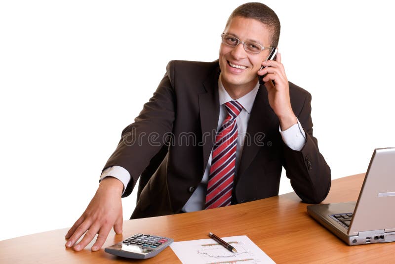 Businessman makes a telephone call in his office. Isolated on white background. Businessman makes a telephone call in his office. Isolated on white background.