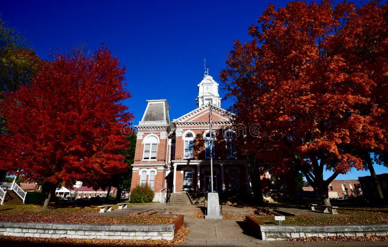 This is a Fall picture of he iconic Howard County Courthouse framed by Fall Foliage located in Fayette, Missouri in Howard County. This 2 1/2-story brick courthouse was designed by the architects of Schrage & Nichols, it is an example of Second Empire architecture, it was built in 1887. This picture was taken on October 28, 2018. This is a Fall picture of he iconic Howard County Courthouse framed by Fall Foliage located in Fayette, Missouri in Howard County. This 2 1/2-story brick courthouse was designed by the architects of Schrage & Nichols, it is an example of Second Empire architecture, it was built in 1887. This picture was taken on October 28, 2018.