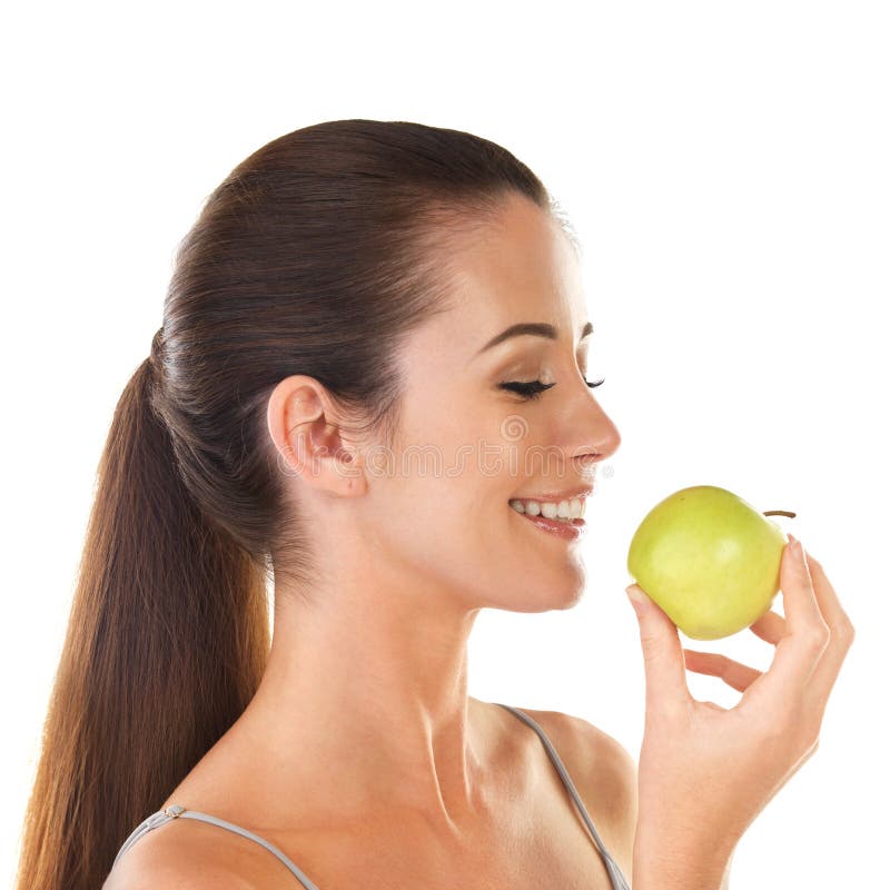 Woman, health and apple smile in studio on white background for digestion, nutrition and snack. Female person, happy and fruit fresh for organic vegan, food or diet for self care and wellness. Woman, health and apple smile in studio on white background for digestion, nutrition and snack. Female person, happy and fruit fresh for organic vegan, food or diet for self care and wellness.