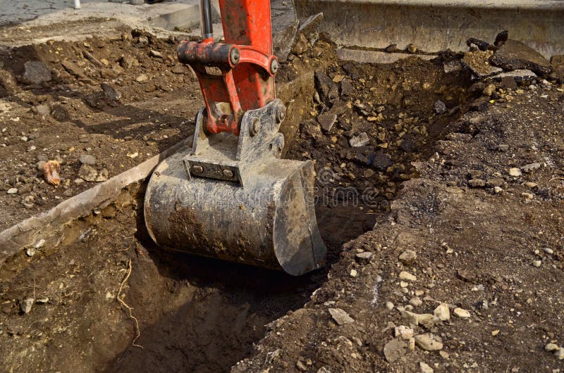 Excavator bucket closeup .Excavation, channel. Excavator bucket closeup .Excavation, channel