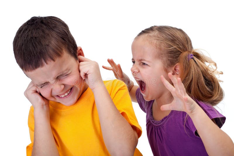 Little girl shouting in anger to a boy - raging kids. Little girl shouting in anger to a boy - raging kids