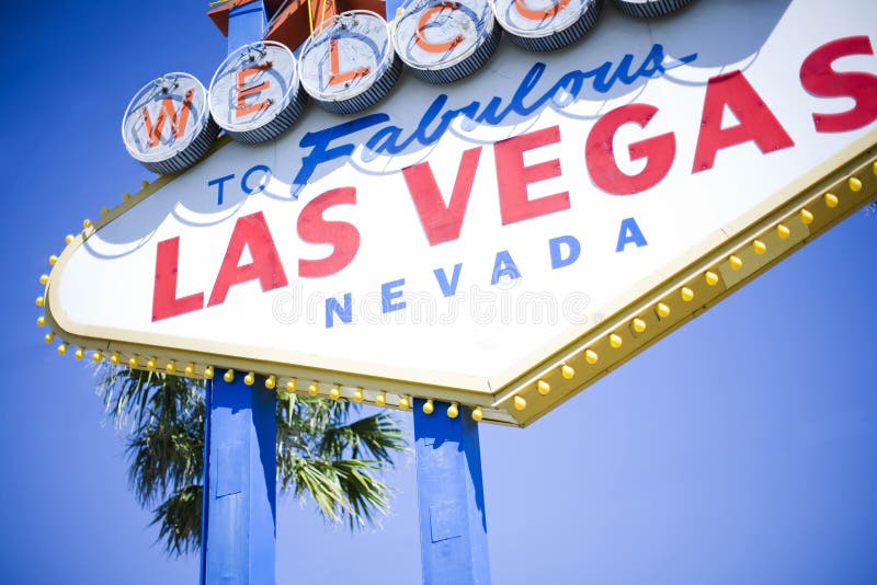 Las Vegas welcome sign with blue sky and palm tree. Las Vegas welcome sign with blue sky and palm tree