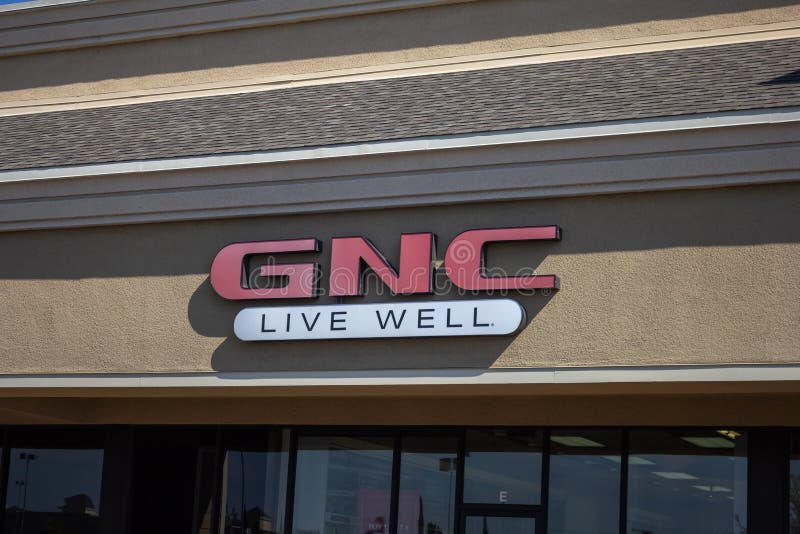 Знак магазина GNC стоковая фотография Знак магазина GNC стоковая фотография