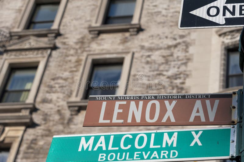 New York Malcom X Boulevard Lenox Avenue street sign in Harlem. New York Malcom X Boulevard Lenox Avenue street sign in Harlem