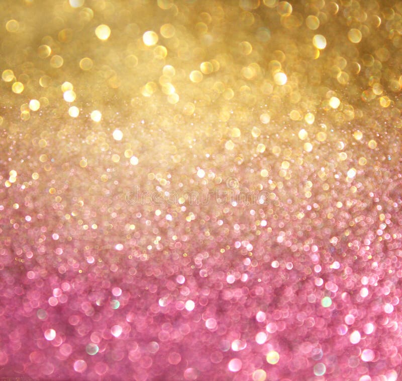 Золото и света bokeh пинка абстрактные. defocused предпосылка стоковые фотографии rf