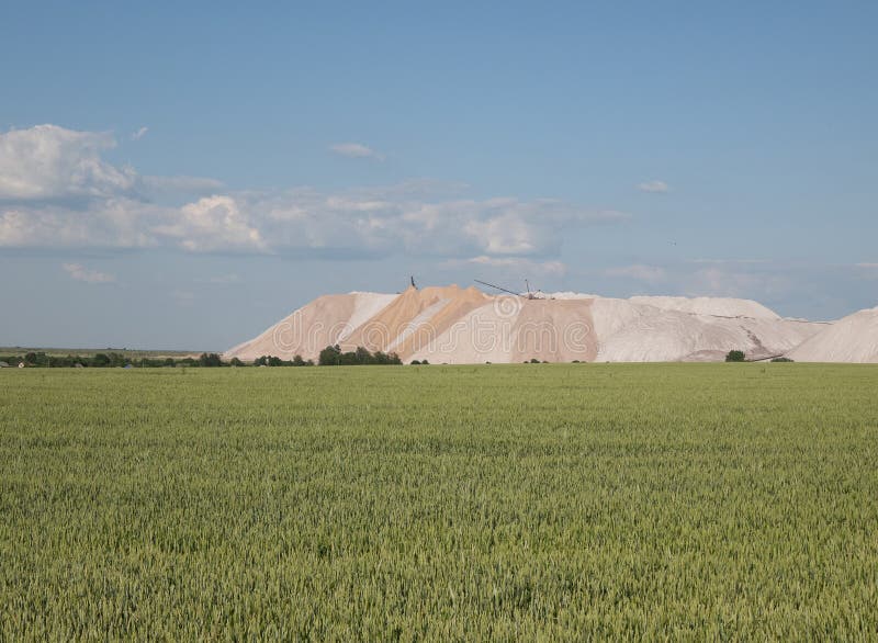 Potash tailings pile area. Landscape with huge salt tailings pile. Salt and mineral dumps. Potash tailings pile area. Landscape with huge salt tailings pile. Salt and mineral dumps