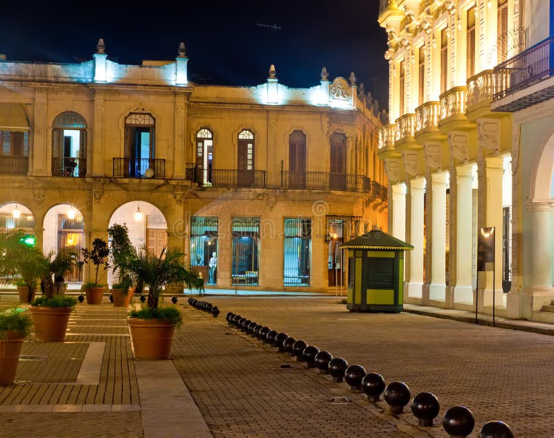 La Plaza Vieja or Old Square , a well known touristisc landmark in Old Havana illuminated at night. La Plaza Vieja or Old Square , a well known touristisc landmark in Old Havana illuminated at night