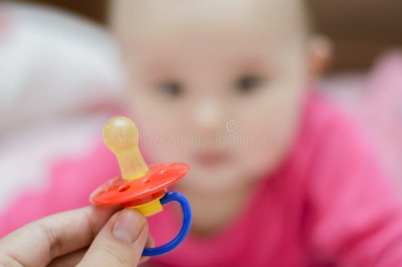 изолированная младенцем белизна силикона pacifier стоковое фото rf изолированная младенцем белизна силикона pacifier стоковое фото rf