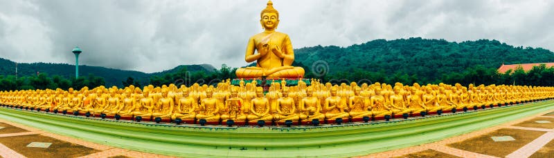 Panorama Buddha image of Lord buddha among the 1,250 monks, the symbol of Magha Puja day, Buddha Memorial park, Nakorn nayok. Panorama Buddha image of Lord buddha among the 1,250 monks, the symbol of Magha Puja day, Buddha Memorial park, Nakorn nayok