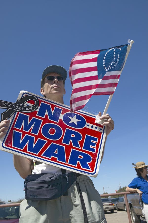 Picture of anti-Bush political rally in Tucson, AZ with sign reading No More War. Picture of anti-Bush political rally in Tucson, AZ with sign reading No More War