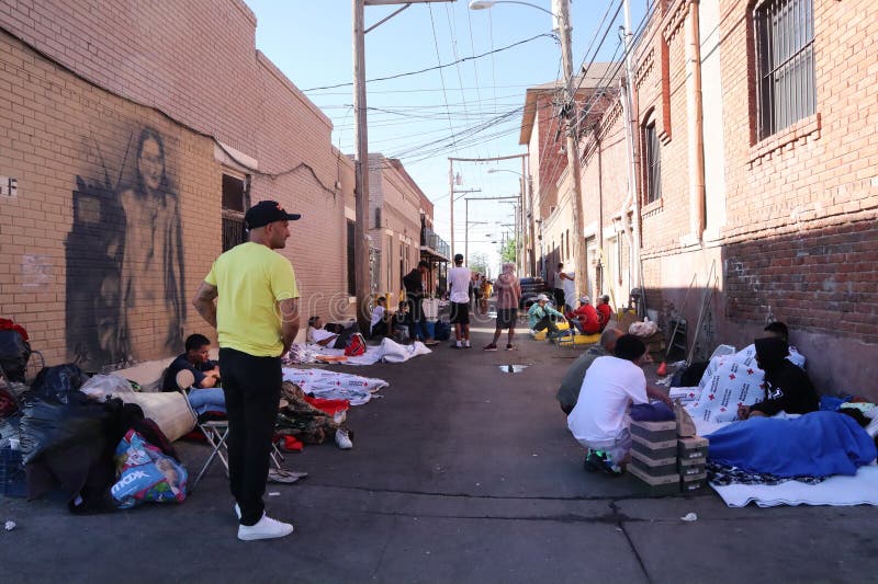 El Paso, TX, USA, May 10th, 2023. Immigrants staying and sleeping in an alley, waiting to approved to enter the USA under Title 42. El Paso, TX, USA, May 10th, 2023. Immigrants staying and sleeping in an alley, waiting to approved to enter the USA under Title 42