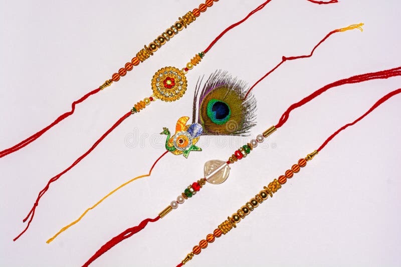 Индийский традиционный фестиваль Raksha Bandhan, элегантное Rakhi на белой изолированной предпосылке стоковое изображение rf Индийский традиционный фестиваль Raksha Bandhan, элегантное Rakhi на белой изолированной предпосылке стоковое изображение rf