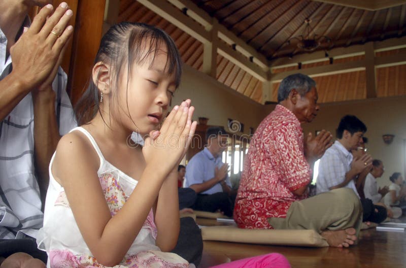 Buddhism followers practise ritual in Solo, Java, Indonesia. A number of different religions are practiced in the country, and their collective influence on the country's political, economic and cultural life is significant. However, the government only recognizes six official religions, that is Islam, Protestantism, Catholicism, Hinduism, Buddhism and Confucianism. Buddhism followers practise ritual in Solo, Java, Indonesia. A number of different religions are practiced in the country, and their collective influence on the country's political, economic and cultural life is significant. However, the government only recognizes six official religions, that is Islam, Protestantism, Catholicism, Hinduism, Buddhism and Confucianism.