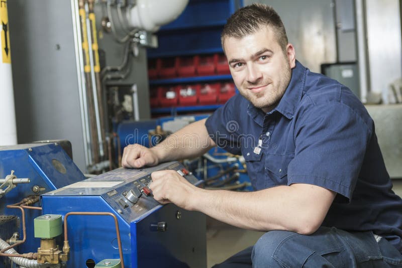 A repairman engineer or inspector who check the system. A repairman engineer or inspector who check the system.