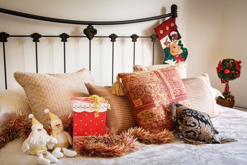 Christmas interior of modern bedroom with wrought iron bed. Christmas interior of modern bedroom with wrought iron bed