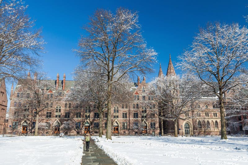 Yale university buildings in winter sunlight with snow and blue sky. Yale university buildings in winter sunlight with snow and blue sky
