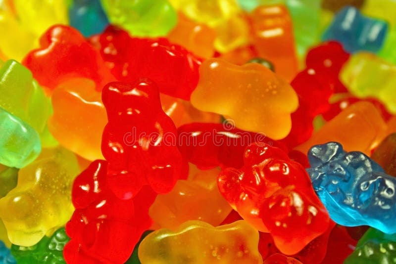 Multi-color gummy bear candy for sale backgrounds. Gummy bears German: Gummibär are small, fruit gum candies, similar to a jelly baby in some English-speaking countries. The candy is roughly 2 cm 0.8 in long and shaped in the form of a bear. The gummy bear is one of many gummies, popular gelatin-based candies sold in a variety of shapes and colors. Multi-color gummy bear candy for sale backgrounds. Gummy bears German: Gummibär are small, fruit gum candies, similar to a jelly baby in some English-speaking countries. The candy is roughly 2 cm 0.8 in long and shaped in the form of a bear. The gummy bear is one of many gummies, popular gelatin-based candies sold in a variety of shapes and colors.