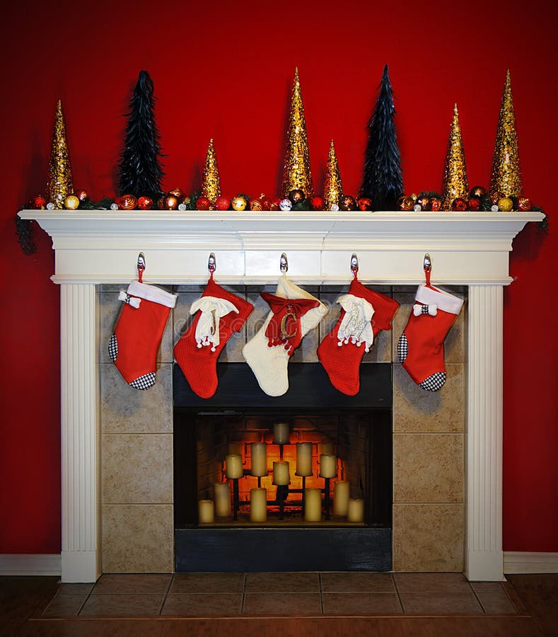 A Beautiful scene of a christmas foreplace with stockings on the mantle. A Beautiful scene of a christmas foreplace with stockings on the mantle.