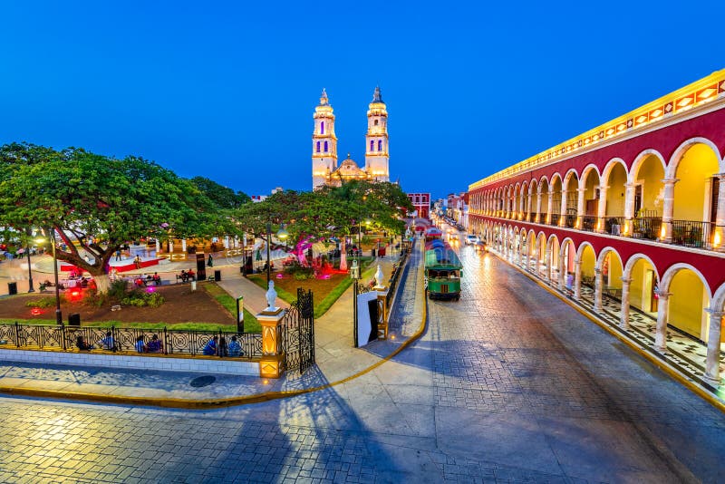 Campeche, Mexico, Independence Plaza, tourist trains and Conception Cathedral. Old Town of San Francisco de Campeche. Campeche, Mexico, Independence Plaza, tourist trains and Conception Cathedral. Old Town of San Francisco de Campeche