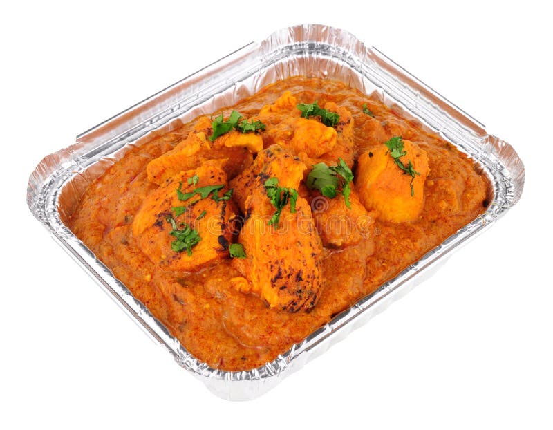 Карри Tikka Masala цыпленка в фольге принимает отсутствующий поднос стоковые фото Карри Tikka Masala цыпленка в фольге принимает отсутствующий поднос стоковые фото
