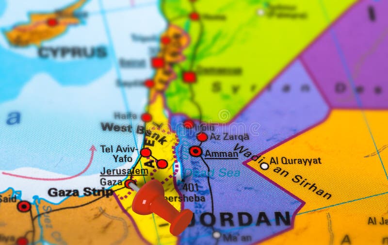 Gaza in Palestine pinned on colorful political map of Middle East. Geopolitical school atlas. Tilt shift effect. Gaza in Palestine pinned on colorful political map of Middle East. Geopolitical school atlas. Tilt shift effect.