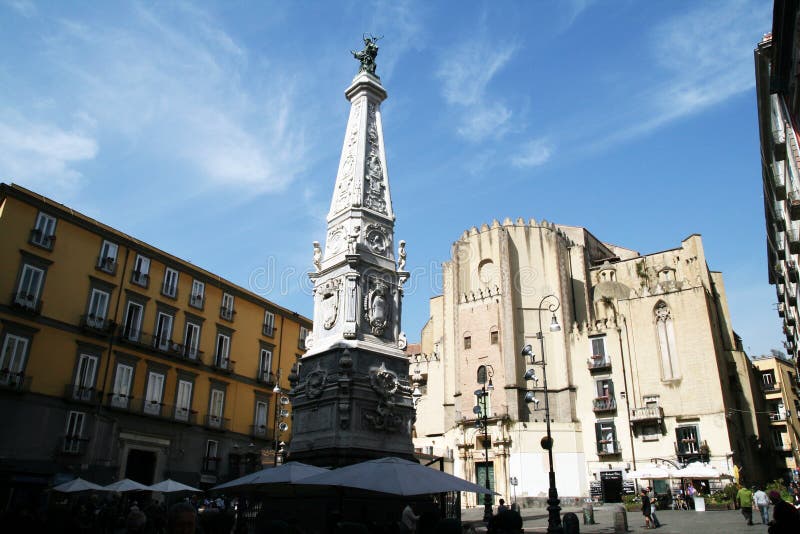 The square and the church of san domenico in the historic center of naples in italy.march 2012. The square and the church of san domenico in the historic center of naples in italy.march 2012