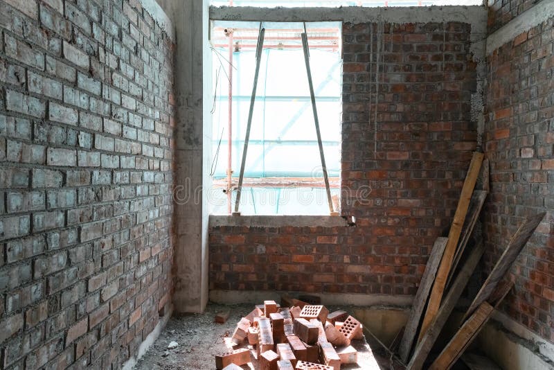 Bricks inside an unfinished building. Bricks inside an unfinished building