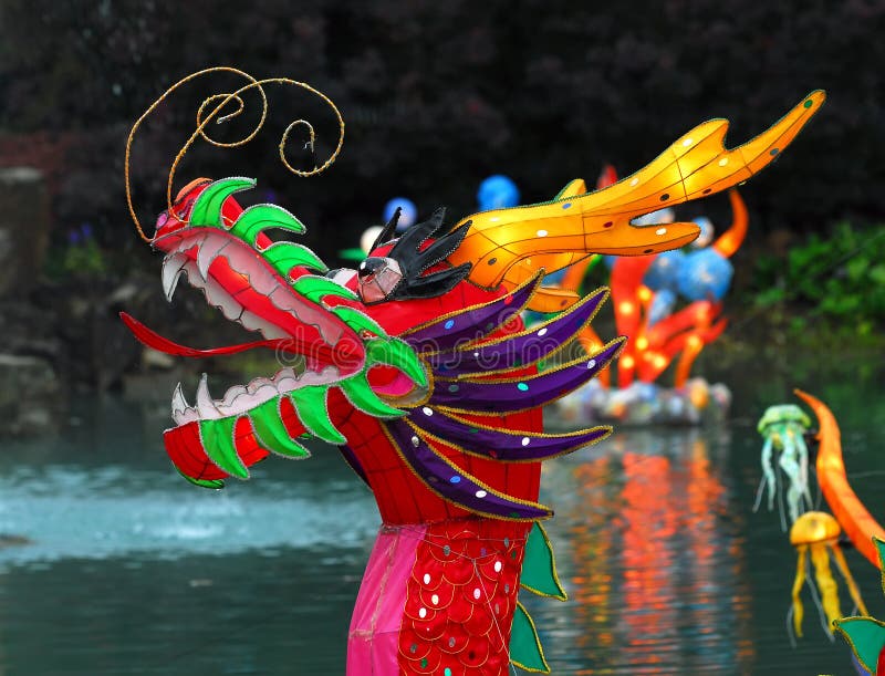 Portrait of an Illuminated Chinese Dragon on a lake. Portrait of an Illuminated Chinese Dragon on a lake