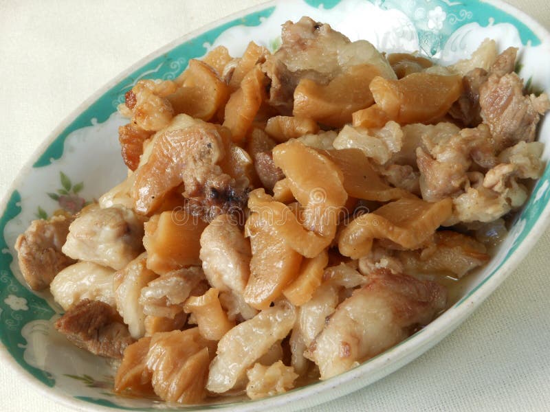Китайским турнепс braised основным блюдом замаринованный с свининой стоковая фотография Китайским турнепс braised основным блюдом замаринованный с свининой стоковая фотография