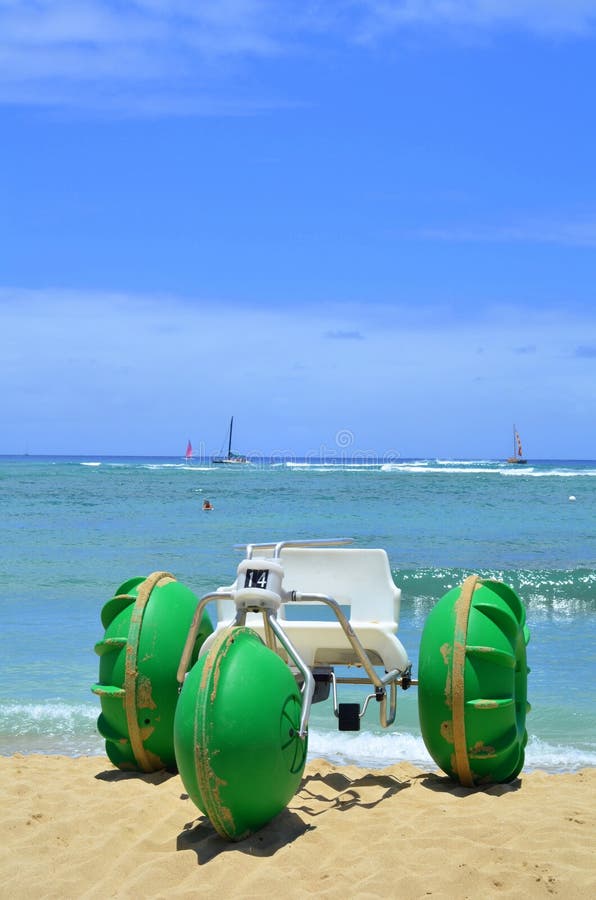 Vacation Image Of A Beach Tricycle With Green Wheels On A Beautiful Beach With Copy Space. Vacation Image Of A Beach Tricycle With Green Wheels On A Beautiful Beach With Copy Space