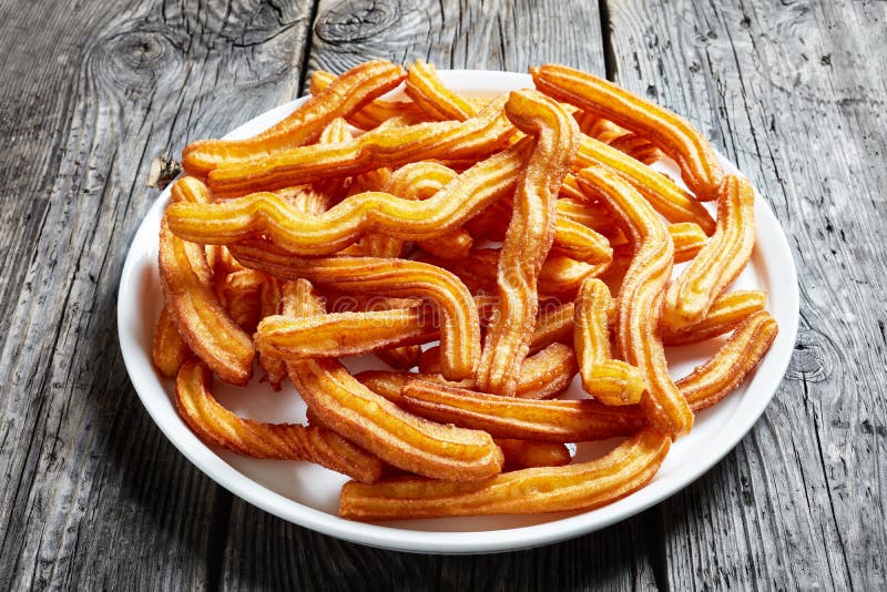 Конец-вверх churros - испанских и мексиканского десерта стоковые изображения Конец-вверх churros - испанских и мексиканского десерта стоковые изображения