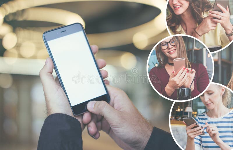 Конец-вверх smartphone с пустым экраном в мужских руках Мужской палец на кнопке устройства стоковое фото