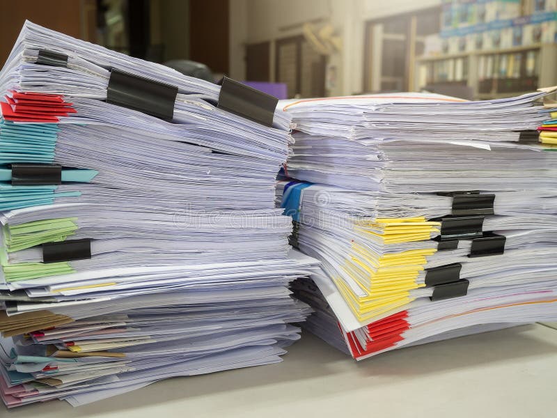 Business Concept, Pile of unfinished business documents on office desk. Business Concept, Pile of unfinished business documents on office desk