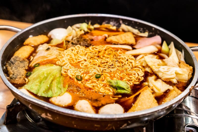 Korean Hot pot \'Budae Jjigae\' is Korean fusion food incorporates American style with noodle, ham, sausages, sliced cheese and Kimchi. Korean Hot pot \'Budae Jjigae\' is Korean fusion food incorporates American style with noodle, ham, sausages, sliced cheese and Kimchi