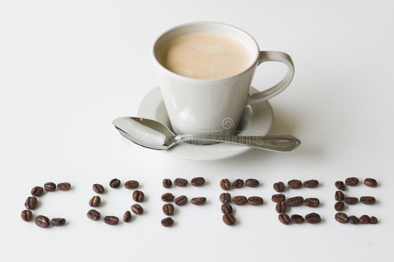 Coffee with coffee beans spelling out 'coffee' ona white background. Coffee with coffee beans spelling out 'coffee' ona white background