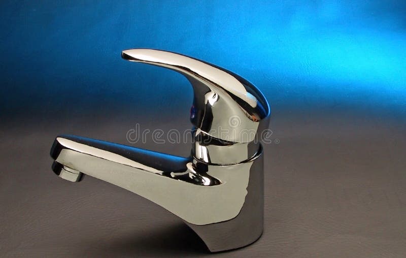 кран голубого faucet стальной стоковая фотография