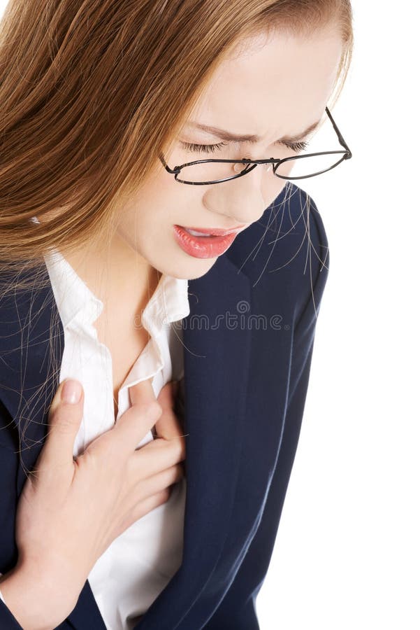 Beautiful business woman touching her chest, feeling unwell. Heart attach, health concept. Isolated on white. Beautiful business woman touching her chest, feeling unwell. Heart attach, health concept. Isolated on white.