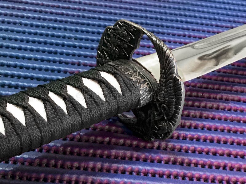 Красивая деталь ручки шпаги katana стоковое фото Красивая деталь ручки шпаги katana стоковое фото