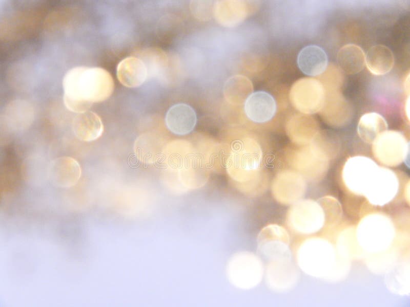 Красивая расплывчатая золотая предпосылка, праздничный свет bokeh стоковые фотографии rf