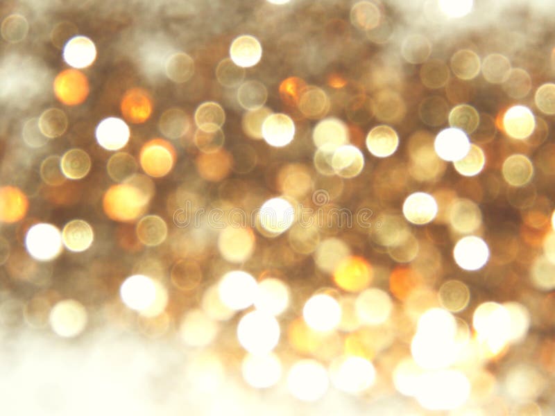 Красивая расплывчатая золотая предпосылка, праздничный свет bokeh стоковые фотографии rf