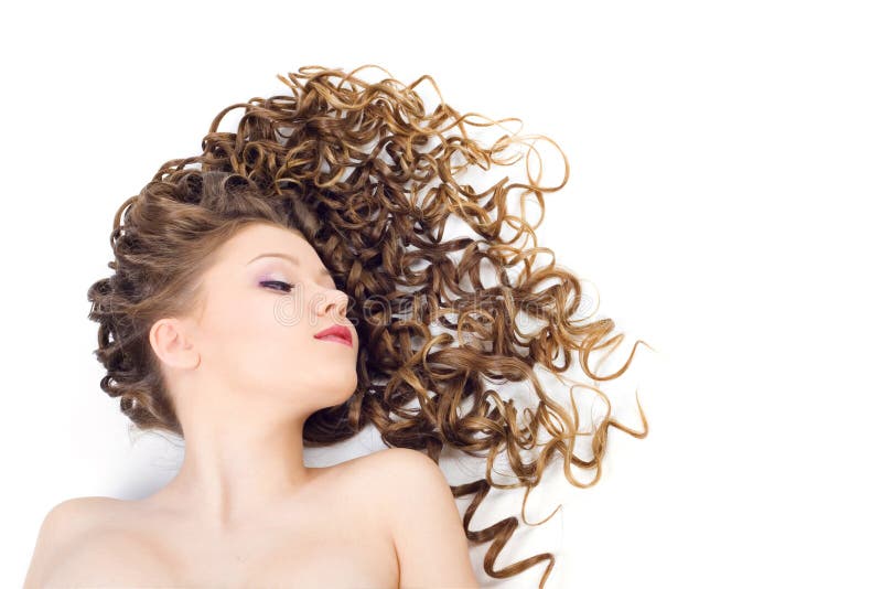 Portrait of the beautiful woman with long curly hair. Portrait of the beautiful woman with long curly hair